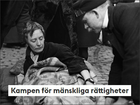 Bild på en människa som tas om hand av sjukvårdare