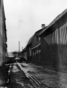 Tavastgatan västerut vid Tavastgatan 54 och 56. Dåvarande kv. Harhuvudet Större. Nu kv. Leporiden ungefär vid Bysistäppan söder om Gamla Lundagatan
