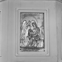 Katolska kyrkan. Predikstolen med bild av aposteln Mattheus